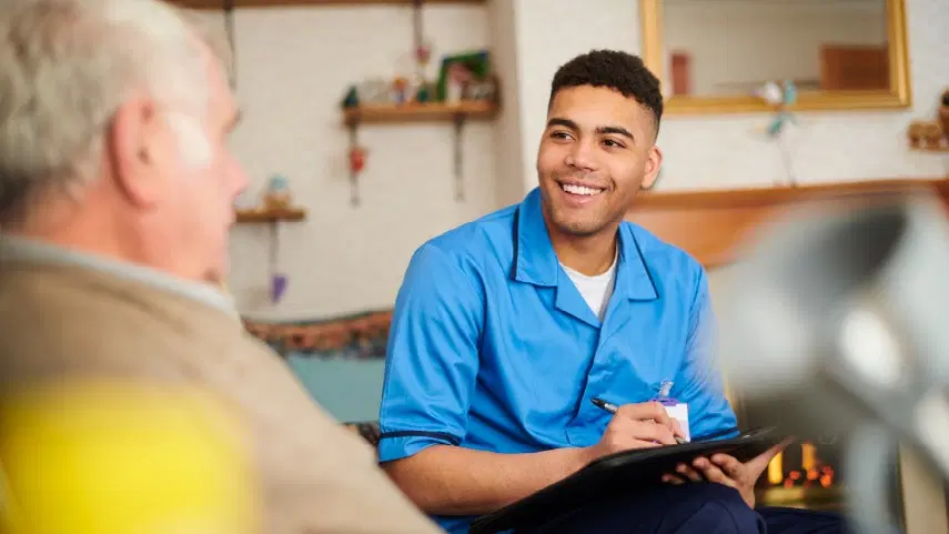 Compassionate caregiver assisting with personal care